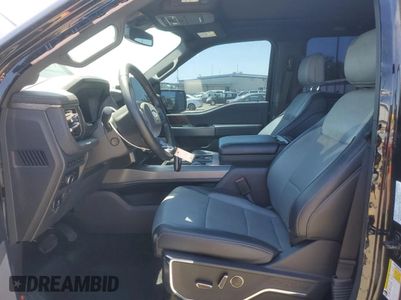 2023 Ford F-150 Lightning Pro with VIN 1FTVW1EV1PWG17333, listed as a Copart auction lot 57904025 with 21,173 mi miles and Salvage title. Bid and sale history available at DreamBid. Image 7.