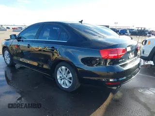 2015 Volkswagen Jetta Sedan 1.8T SE with VIN 3VWD17AJ9FM341950, listed as a IAAI auction lot 41778772 with 121,954 mi miles. Bid and sale history available at carsss.com. Image 3.