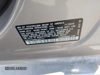 2014 Volkswagen Passat Wolfsburg Edition z VIN 1VWAT7A39EC055174, wystawiony jako IAAI lot #42433368 z przebiegiem 81 321 mil mil oraz . Historia ofert i sprzedaży dostępna na DreamBid. Obrazek 9.