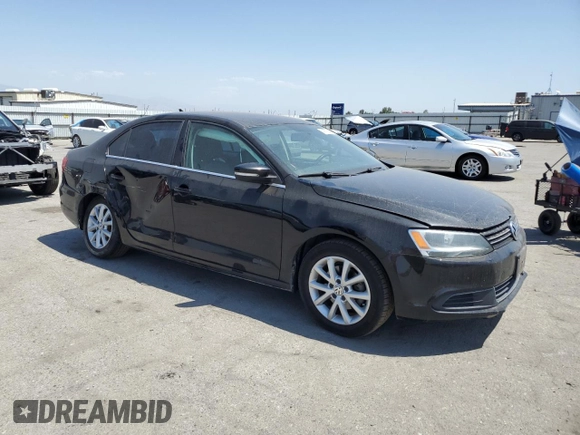 2014 Volkswagen Jetta SE with VIN 3VWD17AJ0EM268515, listed as a Copart auction lot 59977225 with 163,365 mi miles and Salvage title. Bid and sale history available at DreamBid. Image 4.