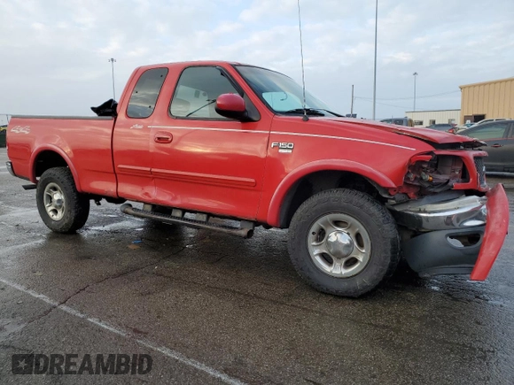 2001 Ford F-150 XL with VIN 1FTRX18L21NA50586, listed as a Copart auction lot 84245554 with 0 mi miles and Salvage Title. Bid and sale history available at carsss.com. Image 4.