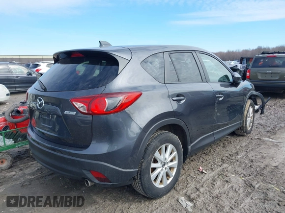 2014 Mazda CX-5 Touring with VIN JM3KE4CY6E0387767, listed as a IAAI auction lot 41698128 with 1 mi miles. Bid and sale history available at carsss.com. Image 4.