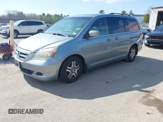 2006 Honda Odyssey EX-L with VIN 5FNRL38656B120539, listed as a IAAI auction lot 42190857 with 242,152 mi miles. Bid and sale history available at carsss.com. Image 2.