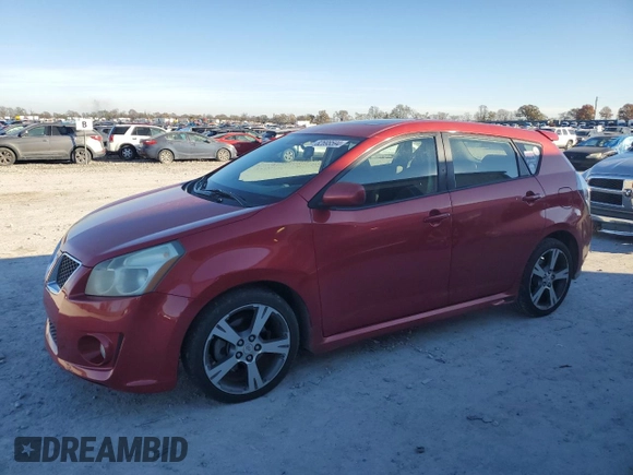 2009 Pontiac Vibe GT with VIN 5Y2SR67049Z461475, listed as a Copart auction lot 82698594 with 169,711 mi miles and Salvage Title. Bid and sale history available at carsss.com. Image 1.