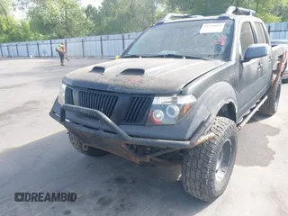 2006 Nissan Frontier LE with VIN 1N6AD07W86C462328, listed as a IAAI auction lot 42520003 with 186,231 mi miles and . Bid and sale history available at DreamBid. Image 6.