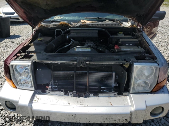 2007 Jeep Commander Sport with VIN 1J8HG48K07C684965, listed as a Copart auction lot 58061005 with 208,951 mi miles and Salvage title. Bid and sale history available at DreamBid. Image 12.