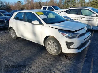 2022 Kia Rio S with VIN 3KPA25AD5NE443465, listed as a IAAI auction lot 41230852 with 20,460 mi miles and . Bid and sale history available at DreamBid. Image 1.