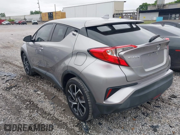 2018 Toyota C-HR XLE with VIN NMTKHMBXXJR031420, listed as a IAAI auction lot 42225490 with 80,628 mi miles and . Bid and sale history available at DreamBid. Image 3.