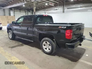 2016 Chevrolet Silverado 1500 LT with VIN 3GCUKREC1GG197804, listed as a Copart auction lot 49918635 with 154,339 mi miles and Salvage Title. Bid and sale history available at DreamBid. Image 2.