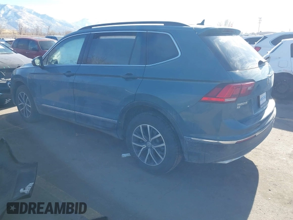 2021 Volkswagen Tiguan SE with VIN 3VV2B7AXXMM089913, listed as a IAAI auction lot 41402158 with 68,158 mi miles and . Bid and sale history available at DreamBid. Image 3.