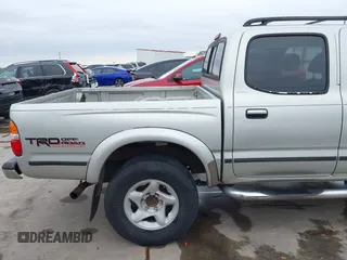 2002 Toyota Tacoma PreRunner with VIN 5TEGN92N42Z888865, listed as a IAAI auction lot 41674113 with 229,651 mi miles and . Bid and sale history available at DreamBid. Image 19.