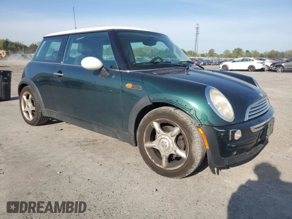 2004 MINI Hardtop with VIN WMWRC334X4TJ61391, listed as a Copart auction lot 53735615 with 103,974 mi miles and Salvage Title. Bid and sale history available at DreamBid. Image 4.