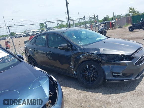 2017 Ford Focus SE with VIN 1FADP3F2XHL235013, listed as a IAAI auction lot 42370565 with 112,276 mi miles and . Bid and sale history available at DreamBid. Image 13.