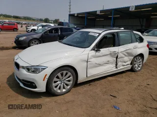 2018 BMW 3 Series 328d xDrive with VIN WBA8J1C53JA018885, listed as a Copart auction lot 64187624 with 84,392 mi miles and Salvage title. Bid and sale history available at DreamBid. Image 1.
