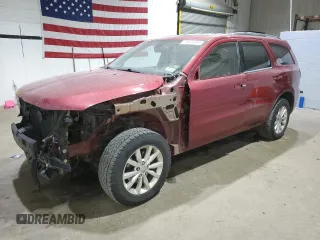 2014 Dodge Durango SXT with VIN 1C4RDJAG7EC586540, listed as a Copart auction lot 58769985 with 354,681 mi miles and Salvage title. Bid and sale history available at DreamBid. Image 1.