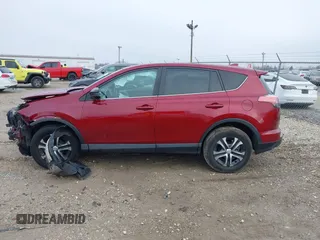 2018 Toyota RAV4 LE with VIN 2T3ZFREV9JW514778, listed as a IAAI auction lot 41202060 with 99,405 mi miles. Bid and sale history available at carsss.com. Image 14.
