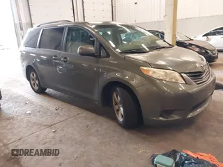 2011 Toyota Sienna LE AAS with VIN 5TDKK3DC1BS073077, listed as a IAAI auction lot 41916750 with 176,822 mi miles. Bid and sale history available at carsss.com. Image 1.