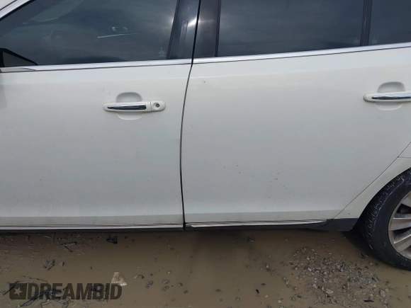 2013 Lincoln MKS EcoBoost with VIN 1LNHL9FT4DG604661, listed as a IAAI auction lot 42211781 with 134,902 mi miles and . Bid and sale history available at DreamBid. Image 14.