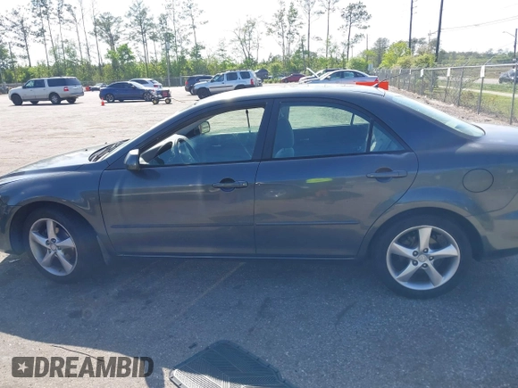 2005 Mazda Mazda6 i with VIN 1YVFP80C555M43599, listed as a IAAI auction lot 41957730 with 144,608 mi miles. Bid and sale history available at carsss.com. Image 14.