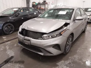 2023 Kia Forte LXS with VIN 3KPF24AD9PE599897, listed as a IAAI auction lot 41966013 with 45,823 mi miles and . Bid and sale history available at DreamBid. Image 6.