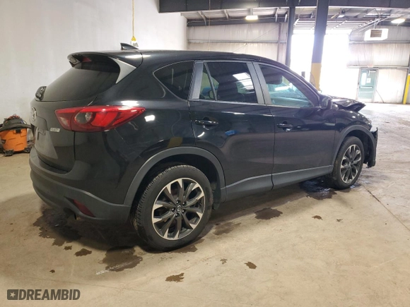 2016 Mazda CX-5 Grand Touring with VIN JM3KE4DY6G0725413, listed as a Copart auction lot 51985445 with 177,633 mi miles and Salvage Title. Bid and sale history available at carsss.com. Image 3.