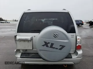 2005 Suzuki XL7 LX z VIN JS3TX92V054108383, wystawiony jako Copart lot #85280414 z przebiegiem 128 594 mil mil oraz Szkoda całkowita • Salvage title. Historia ofert i sprzedaży dostępna na DreamBid. Obrazek 6.