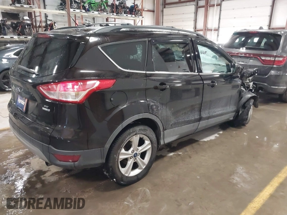 2013 Ford Escape SE with VIN 1FMCU9GX6DUC07446, listed as a IAAI auction lot 41089866 with 119,018 mi miles. Bid and sale history available at carsss.com. Image 4.