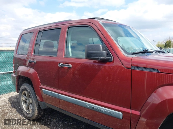 2008 Jeep Liberty Sport with VIN 1J8GN28K68W111462, listed as a IAAI auction lot 42012567 with 129,077 mi miles. Bid and sale history available at carsss.com. Image 14.