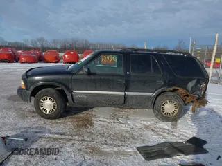 1999 GMC Jimmy SLE with VIN 1GKDT13W5X2520020, listed as a IAAI auction lot 41337936 with 277,615 mi miles. Bid and sale history available at carsss.com. Image 14.