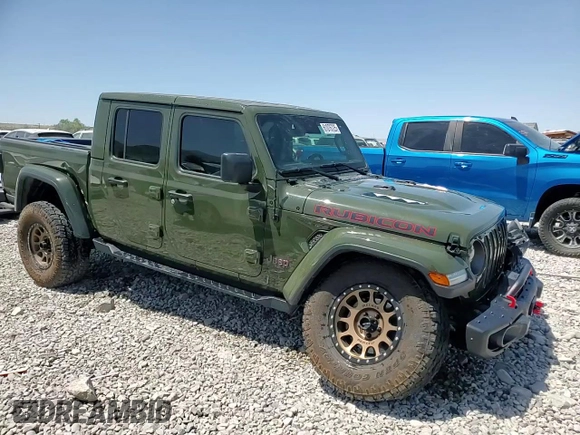 2023 Jeep Gladiator Rubicon с VIN 1C6JJTBM8PL515539, выставлен на аукционе Copart как лот 61076725 с пробегом 21 434 миль миль и Списание • Salvage title. История ставок и продаж доступна на DreamBid. Изображение 14.