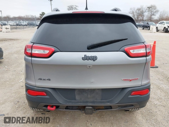 2016 Jeep Cherokee Trailhawk with VIN 1C4PJMBS7GW192574, listed as a IAAI auction lot 41986638 with 144,970 mi miles and . Bid and sale history available at DreamBid. Image 16.
