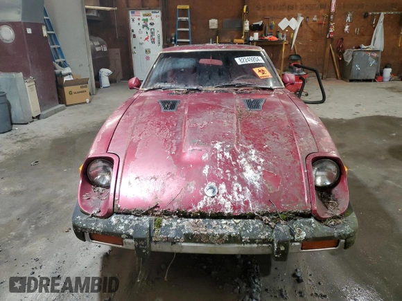 1981 Datsun 280ZX z VIN JN1HZ04S1BX414616, wystawiony jako Copart lot #82249204 z przebiegiem 114 028 mil mil oraz Tytuł czysty. Historia ofert i sprzedaży dostępna na DreamBid. Obrazek 5.