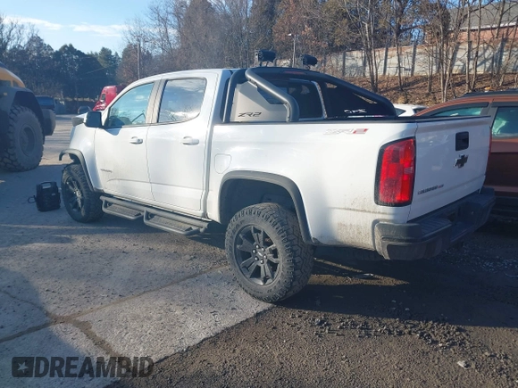 2018 Chevrolet Colorado 4WD ZR2 with VIN 1GCGTEEN7J1296573, listed as a IAAI auction lot 41486855 with 85,920 mi miles. Bid and sale history available at carsss.com. Image 3.