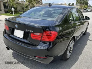 2014 BMW 3 Series 328i with VIN WBA3C1C52EK108680, listed as a IAAI auction lot 42153830 with 73,464 mi miles. Bid and sale history available at carsss.com. Image 4.