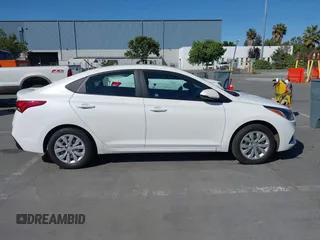 2021 Hyundai Accent SE z VIN 3KPC24A6XME153337, wystawiony jako IAAI lot #42344593 z przebiegiem 86 079 mil mil oraz . Historia ofert i sprzedaży dostępna na DreamBid. Obrazek 13.