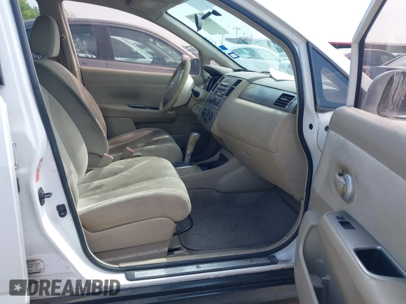 2008 Nissan Versa 1.8 S with VIN 3N1BC11E38L392277, listed as a IAAI auction lot 41927976 with 135,795 mi miles. Bid and sale history available at carsss.com. Image 5.