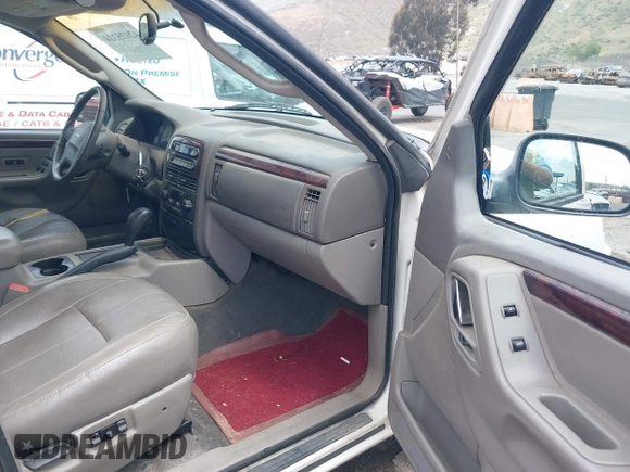 2002 Jeep Grand Cherokee Limited with VIN 1J4GX58S52C305020, listed as a IAAI auction lot 42025324 with 214,214 mi miles and . Bid and sale history available at DreamBid. Image 5.