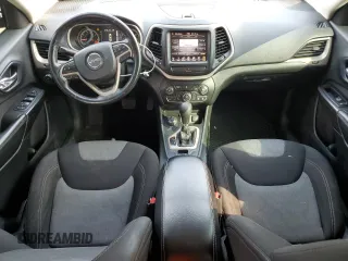2014 Jeep Cherokee Latitude z VIN 1C4PJMCB5EW140470, wystawiony jako Copart lot #60507155 z przebiegiem 148 895 mil mil oraz Czysty tytuł • Clean title. Historia ofert i sprzedaży dostępna na DreamBid. Obrazek 8.
