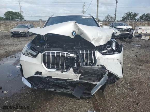 2025 BMW X1 xDrive28i with VIN WBX73EF03S5054170, listed as a Copart auction lot 73397044 with 122 mi miles and Non Repairable. Bid and sale history available at carsss.com. Image 5.