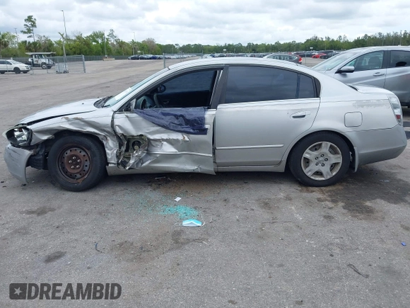 2004 Nissan Altima S with VIN 1N4AL11D04C130857, listed as a IAAI auction lot 41661519 with 147,518 mi miles. Bid and sale history available at carsss.com. Image 15.