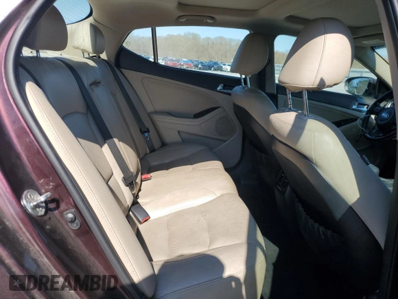2014 Kia Optima EX z VIN 5XXGN4A7XEG304512, wystawiony jako Copart lot #50656505 z przebiegiem 141 746 mil mil oraz Szkoda całkowita • Salvage title. Historia ofert i sprzedaży dostępna na DreamBid. Obrazek 10.