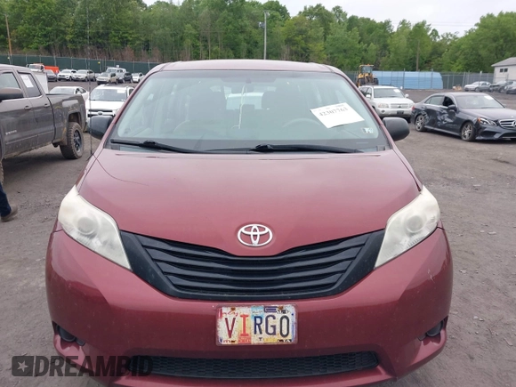 2014 Toyota Sienna L z VIN 5TDZK3DC2ES505680, wystawiony jako IAAI lot #42307763 z przebiegiem 170 628 mil mil oraz . Historia ofert i sprzedaży dostępna na DreamBid. Obrazek 12.