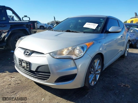 2016 Hyundai Veloster with VIN KMHTC6AD3GU297790, listed as a IAAI auction lot 41077297 with 117,239 mi miles. Bid and sale history available at carsss.com. Image 2.