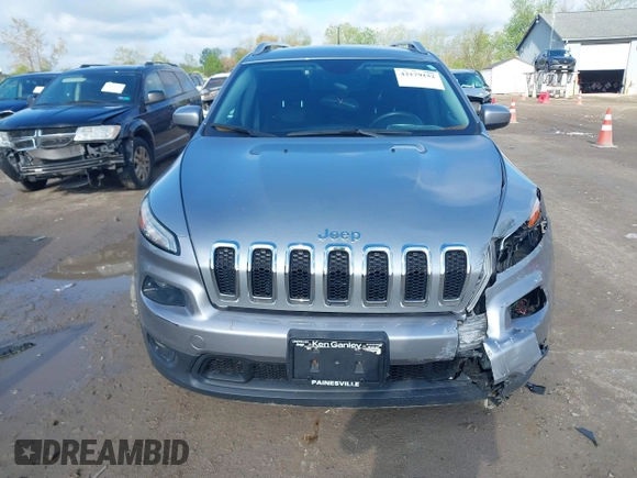 2014 Jeep Cherokee Latitude z VIN 1C4PJMCSXEW294950, wystawiony jako IAAI lot #42179152 z przebiegiem 105 796 mil mil oraz . Historia ofert i sprzedaży dostępna na DreamBid. Obrazek 12.