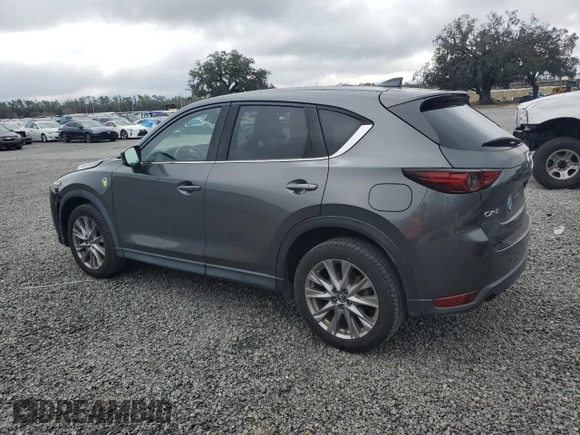 2020 Mazda CX-5 Grand Touring with VIN JM3KFADM6L0839527, listed as a Copart auction lot 46677475 with 50,305 mi miles and Salvage Title. Bid and sale history available at DreamBid. Image 2.