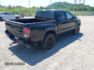 2019 Toyota Tacoma SR with VIN 5TFCZ5AN4KX208354, listed as a IAAI auction lot 42771410 with 77,509 mi miles and . Bid and sale history available at DreamBid. Image 4.