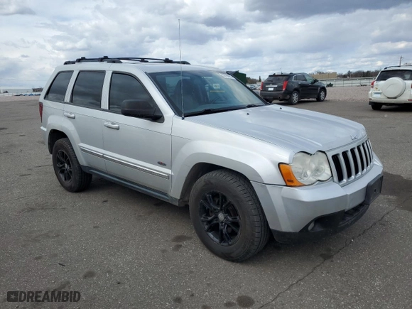 2008 Jeep Grand Cherokee Laredo with VIN 1J8HR48MX8C233846, listed as a Copart auction lot 50766955 with 134,404 mi miles and Salvage Title. Bid and sale history available at carsss.com. Image 4.