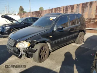 2000 Mercedes-Benz M 320/430/500 with VIN 4JGAB72E4YA162490, listed as a Copart auction lot 84935944 with 170,189 mi miles and Salvage title. Bid and sale history available at DreamBid. Image 1.