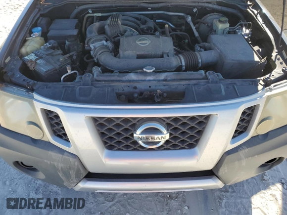 2015 Nissan Xterra S with VIN 5N1AN0NU2FN650814, listed as a Copart auction lot 82827764 with 151,429 mi miles and Salvage Title. Bid and sale history available at DreamBid. Image 12.