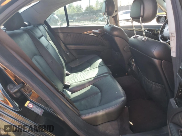 2003 Mercedes-Benz E-Class 5.0L with VIN WDBUF70J53A199951, listed as a Copart auction lot 51138595 with 129,414 mi miles and Salvage Title. Bid and sale history available at carsss.com. Image 10.